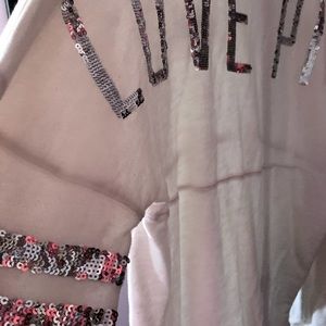 Pink brand white long sleeved bling shirt. Size Small